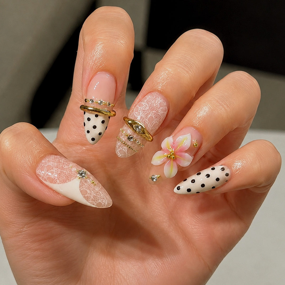 Artificial nail set with floral and glittering accents Stornfield