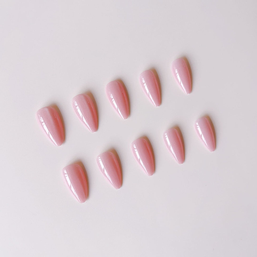 Acrylic nail set with glamorous high-gloss finish and delicate glitter accents Stornfield