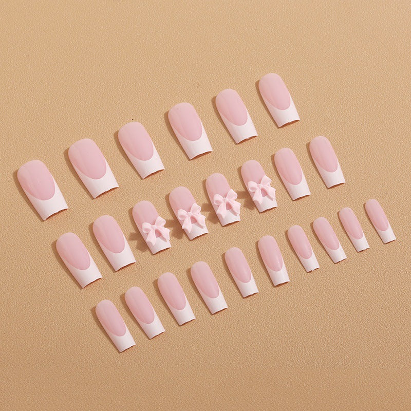 Art nail set with delicate bow decorations Stornfield