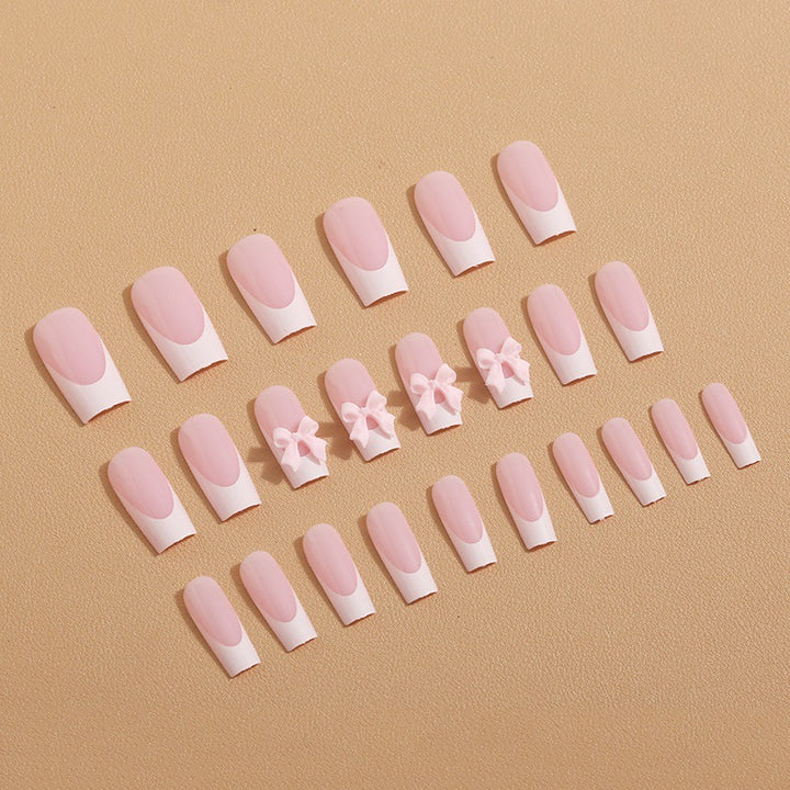 Art nail set with delicate bow decorations Stornfield