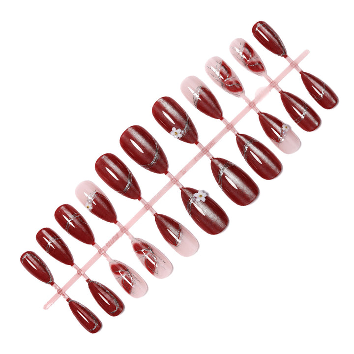 Decorative Press-On Nail Art with Floral Accents Stornfield