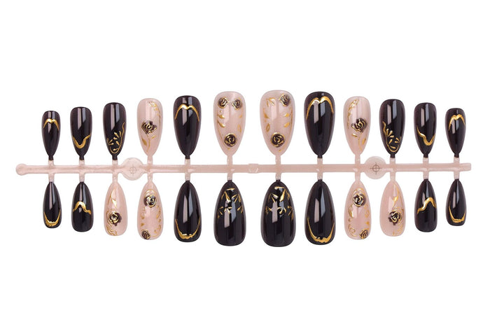 Nail set with elegant gold embellishments and original patterns Stornfield