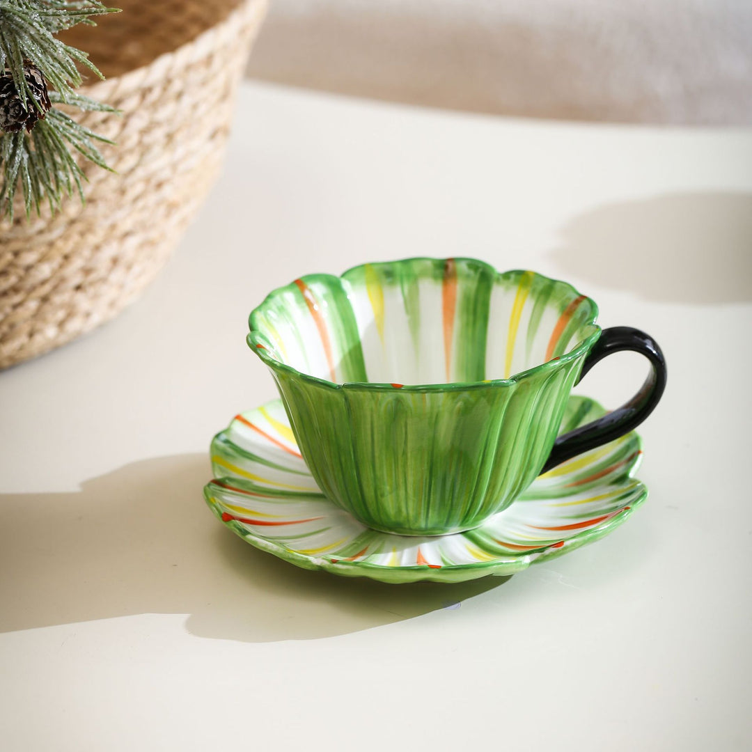 Handcrafted ceramic mug with shell-shaped wave edge and contrasting handle