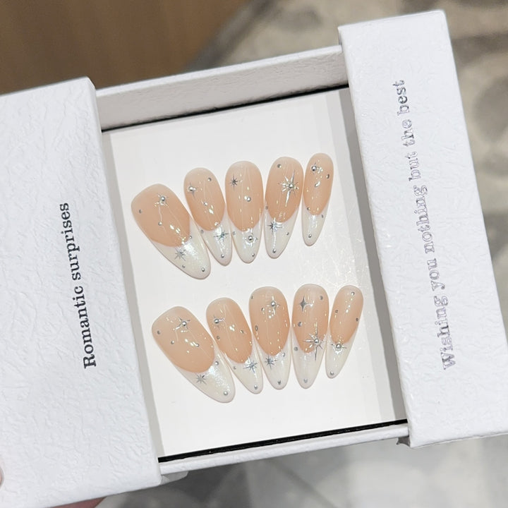 Glamorous artificial nails with romantic star pattern Stornfield