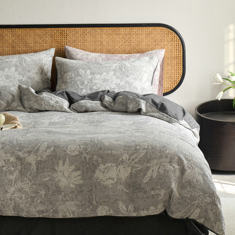Reversible cotton bedding set with floral toile print and linen look