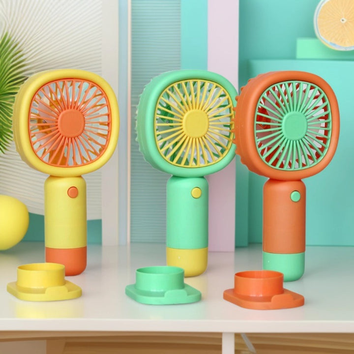 Unisex Handheld Fan with ergonomic design and practical stand function Stornfield