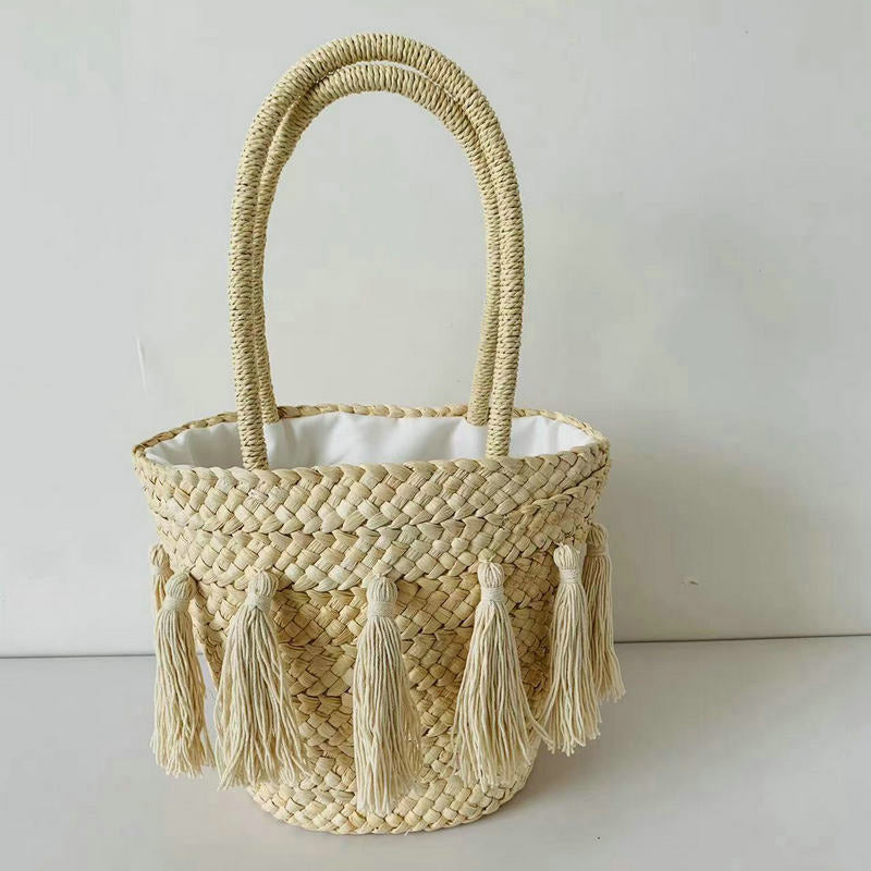 Trendy basket bag with tassels Stornfield