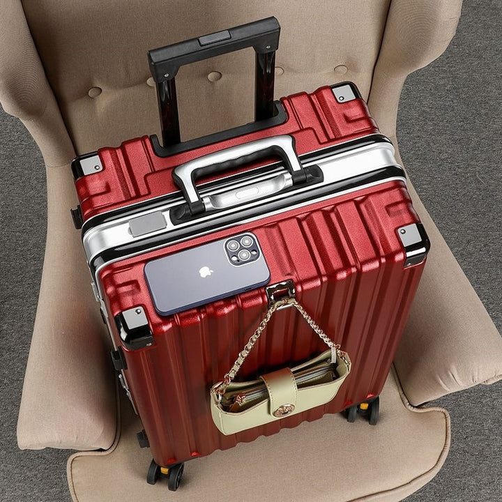 Hard-shell suitcase with double safety lock and sturdy rolling system Stornfield