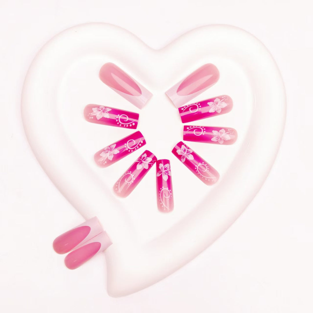 Artificial nails with floral accents and shine Stornfield