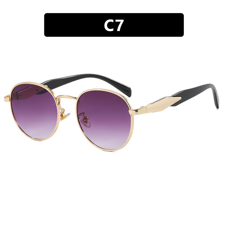 Women's round sunglasses with elegant, golden frame and UV protection Stornfield