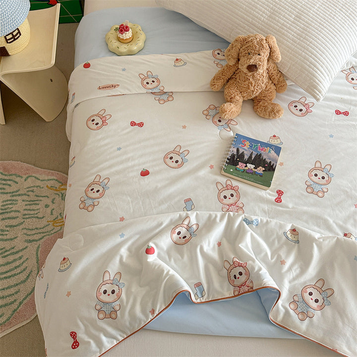 Quilted children's comforter with cute animal print and light microfiber filling