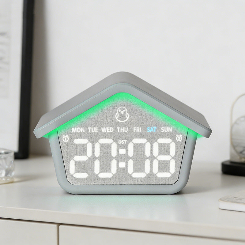 Digital alarm clock in creative house design Stornfield