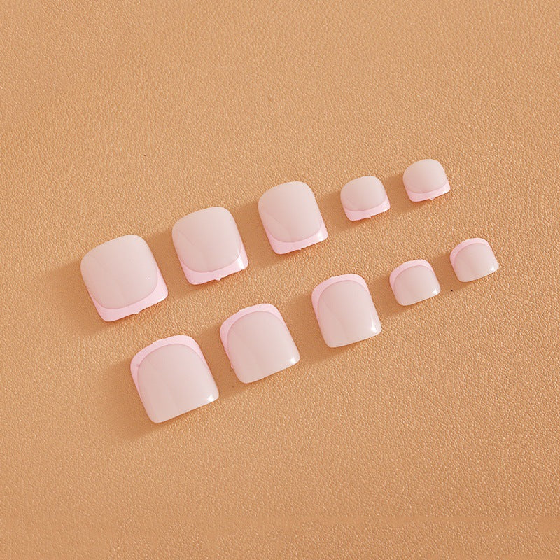 Nail art set with elegant French design and glitter accents Stornfield