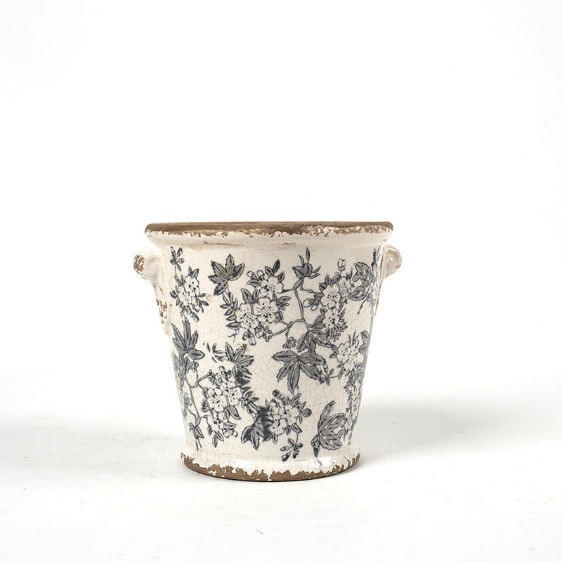 Decorative flower pot with floral embellishments Stornfield
