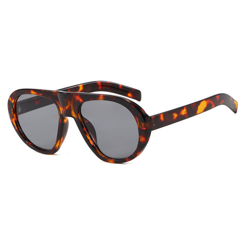 Women striking sunglasses with futuristic frame and sturdy design Stornfield