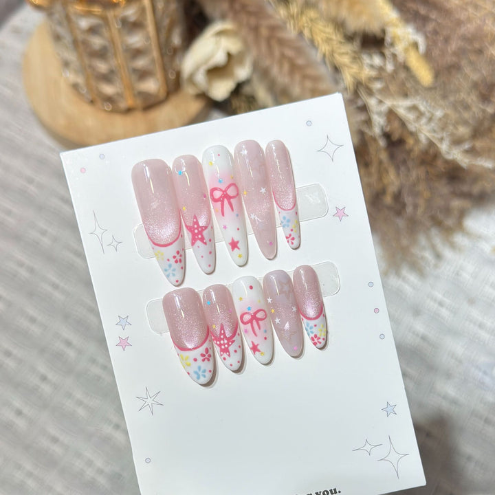 Artistic Press-On Nail Art Set with Charming Star and Bow Designs Stornfield