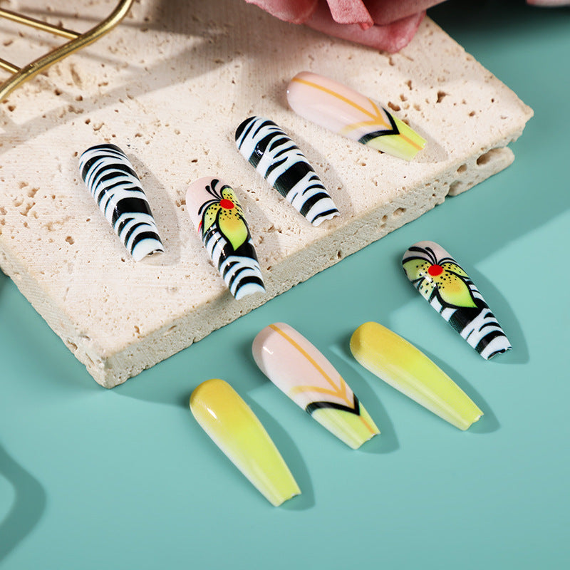 Creative press-on nails with flower and animal designs Stornfield
