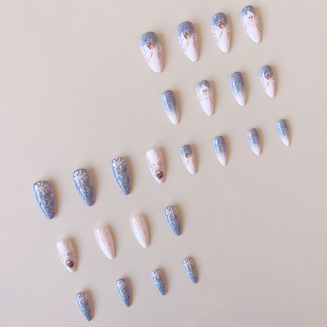 Nail art set with enchanting fairy motifs and glitter accents Stornfield