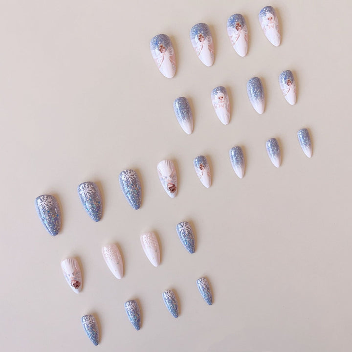 Nail art set with enchanting fairy motifs and glitter accents Stornfield