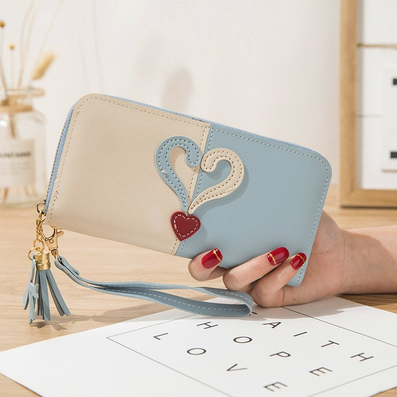 Stylish wallet with heart appliqués Stornfield