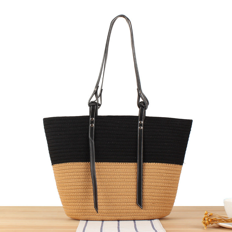 Braided beach bag with elegant faux leather handles Stornfield