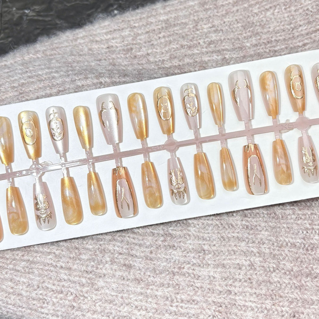 Elegant Press-On Nail Art Set with Gold Accents