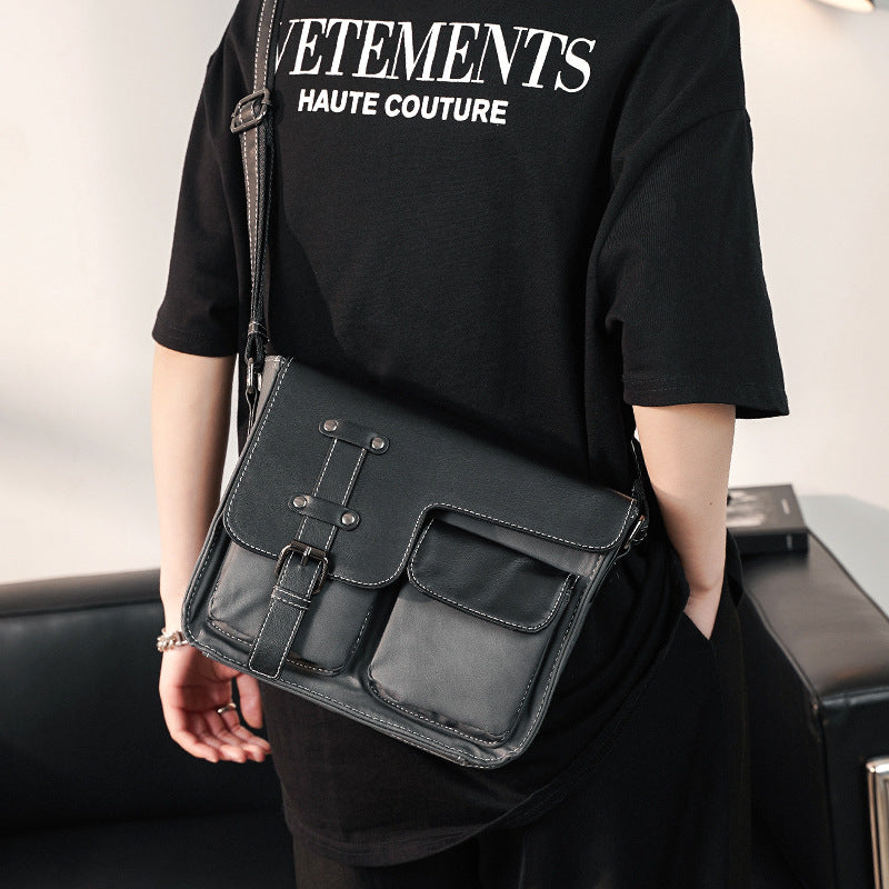 Robust shoulder bag with multiple external pockets Stornfield