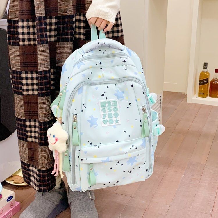 Playful backpack with star motifs and practical functions Stornfield