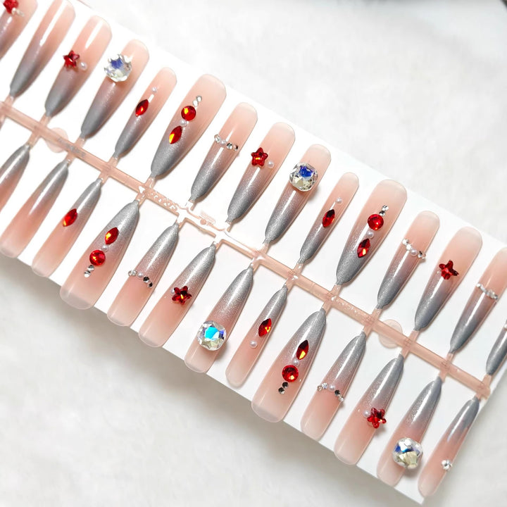 Artificial nails with glamorous glitter design and 3D applications Stornfield