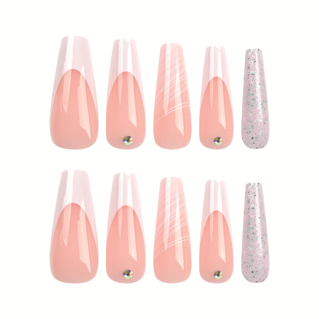 Artificial nail extensions with elegant glitter design Stornfield
