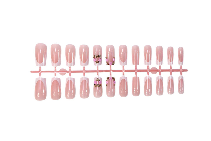 Nail art set with delicate flower and glitter accents Stornfield