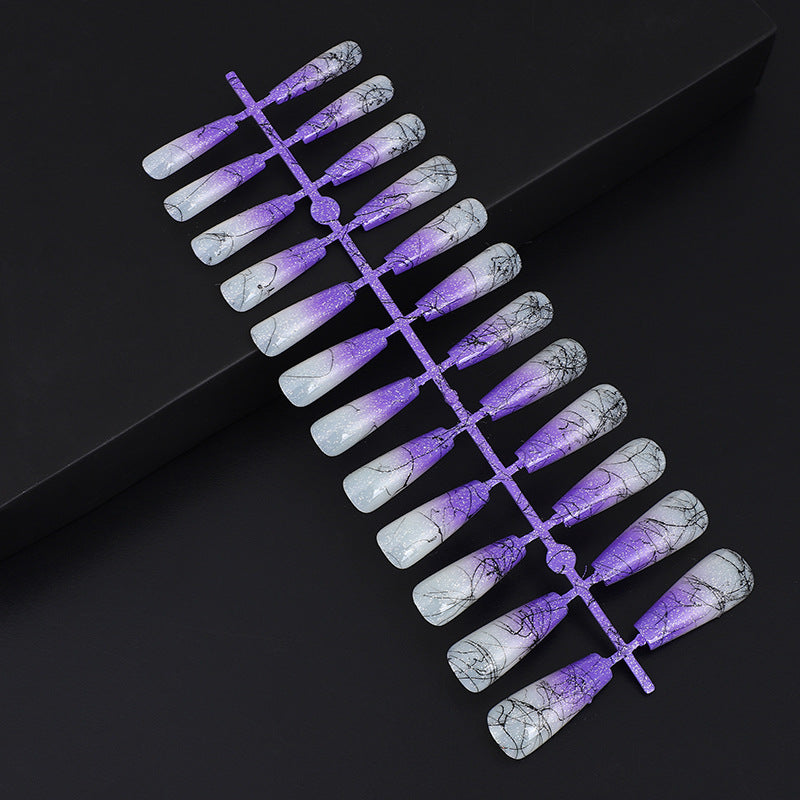 Artificial nails in modern ombre design with marbled accents Stornfield