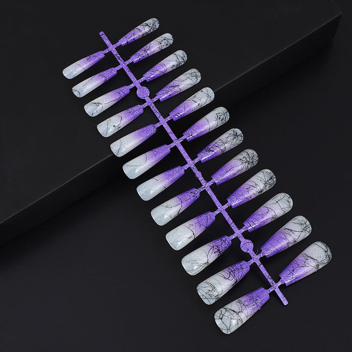 Artificial nails in modern ombre design with marbled accents Stornfield