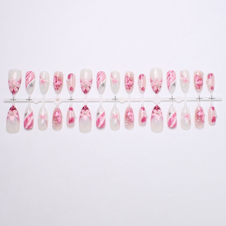Acrylic nail set with elegant flower and glitter pattern Stornfield