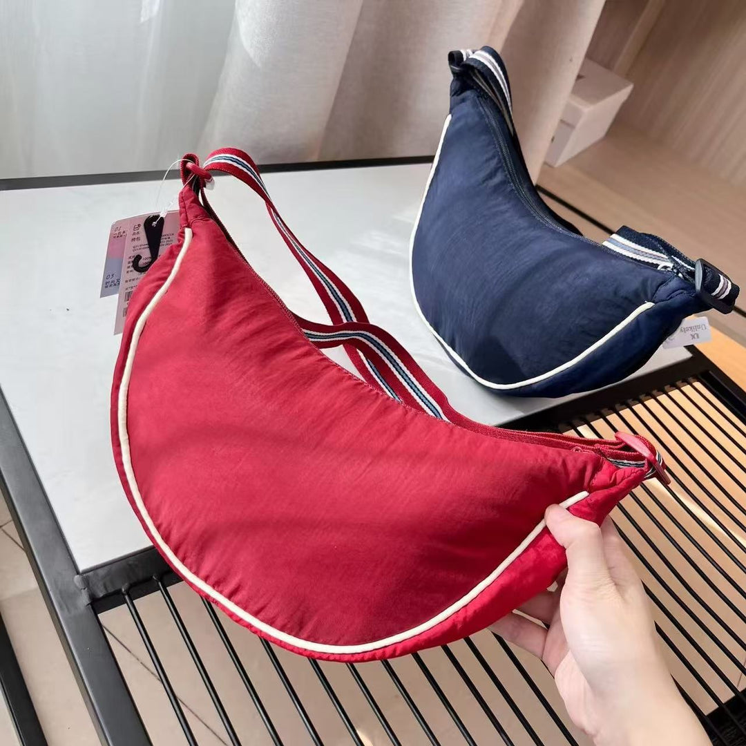 Shoulder bag with adjustable shoulder strap and versatile interior compartment Stornfield