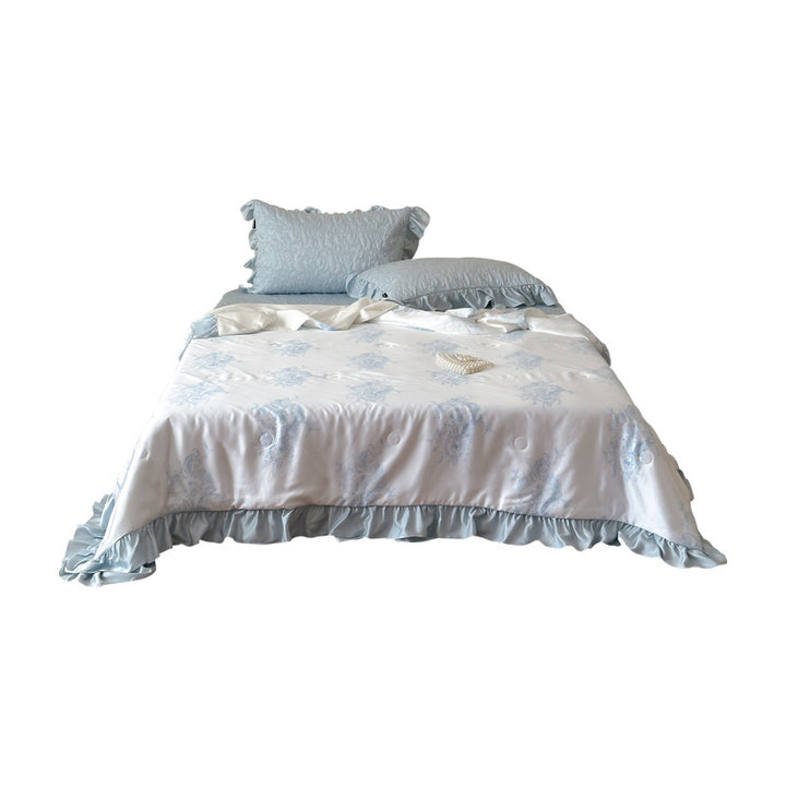 Quilted bedspread with ruffle and reversible satin bedding set