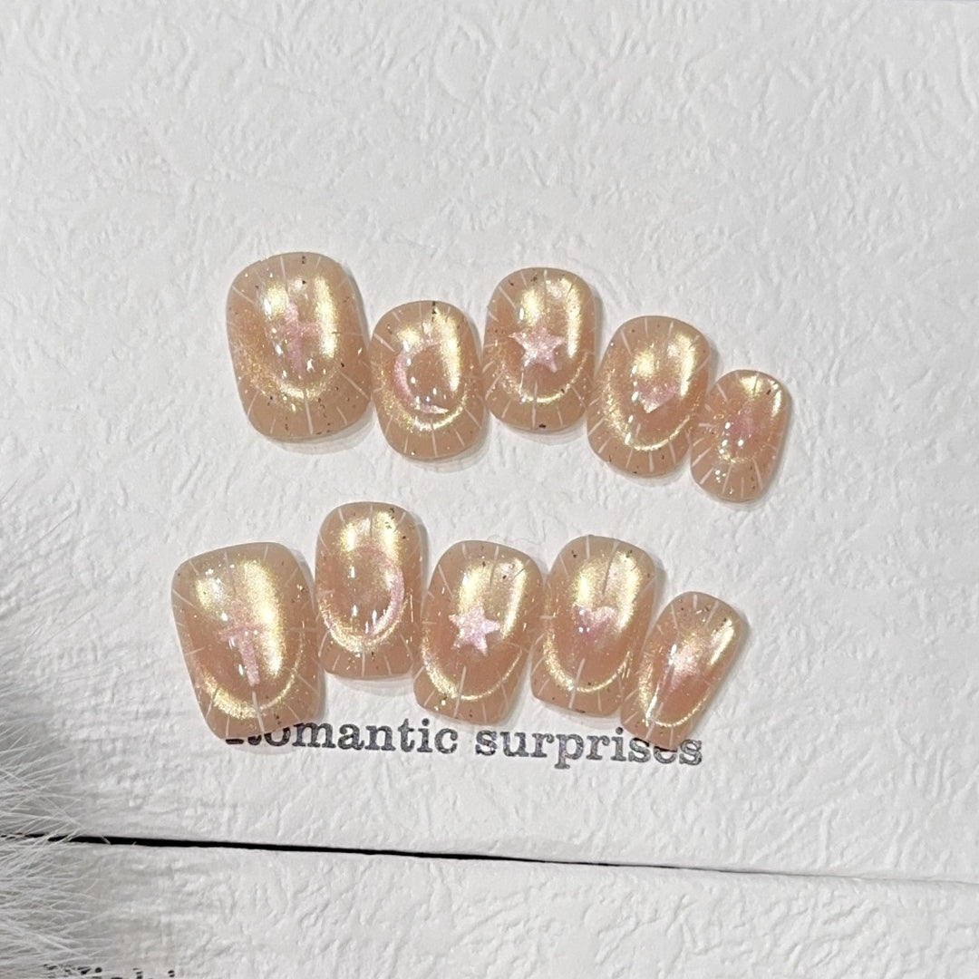 Shiny artificial nail tips with romantic shimmer Stornfield