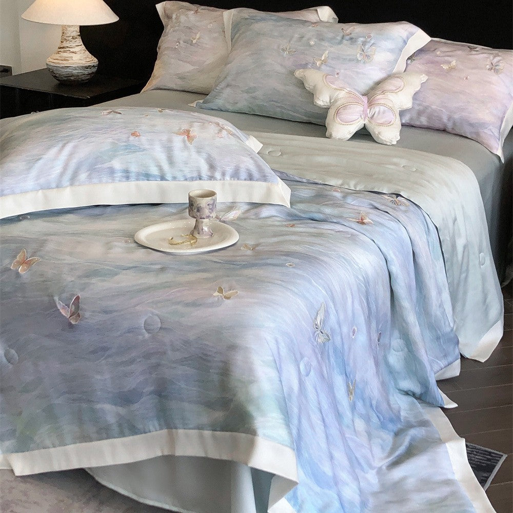 Luxurious satin bedding set with butterfly embroidery and decorative pillow