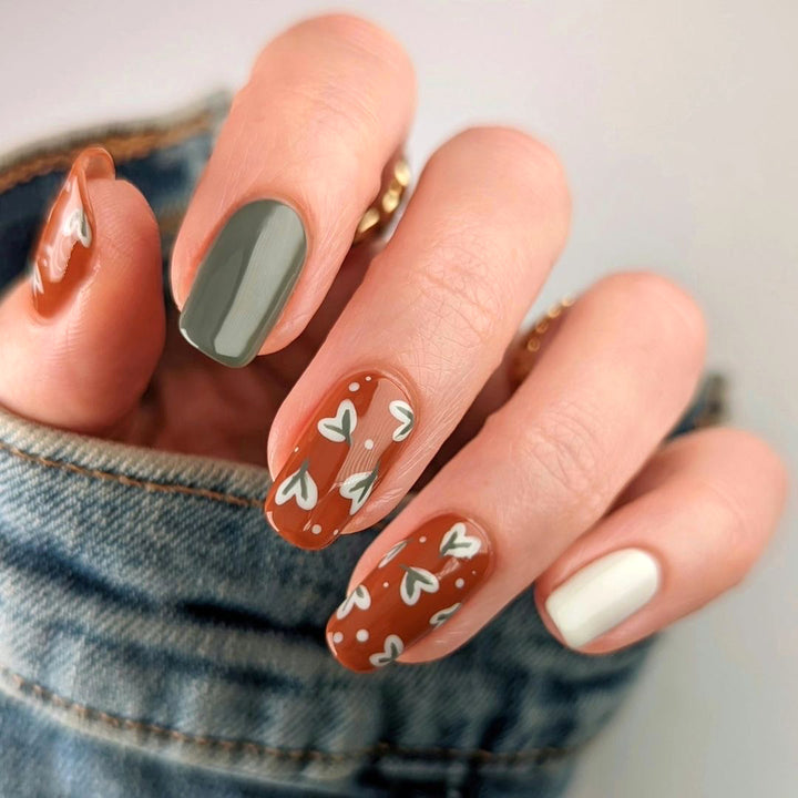 Elegant artificial nails with creative heart decorations Stornfield