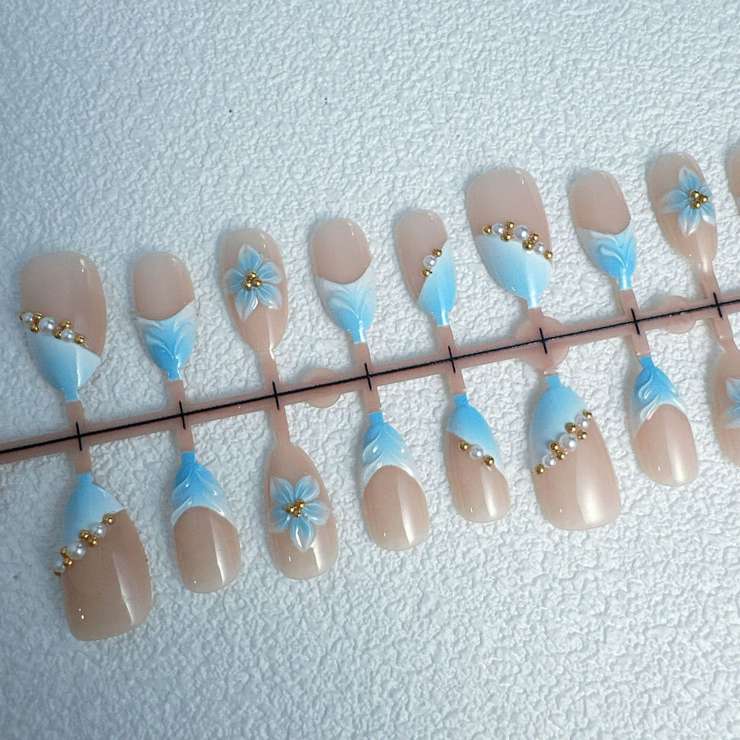 Elegant artificial nails with floral accents Stornfield
