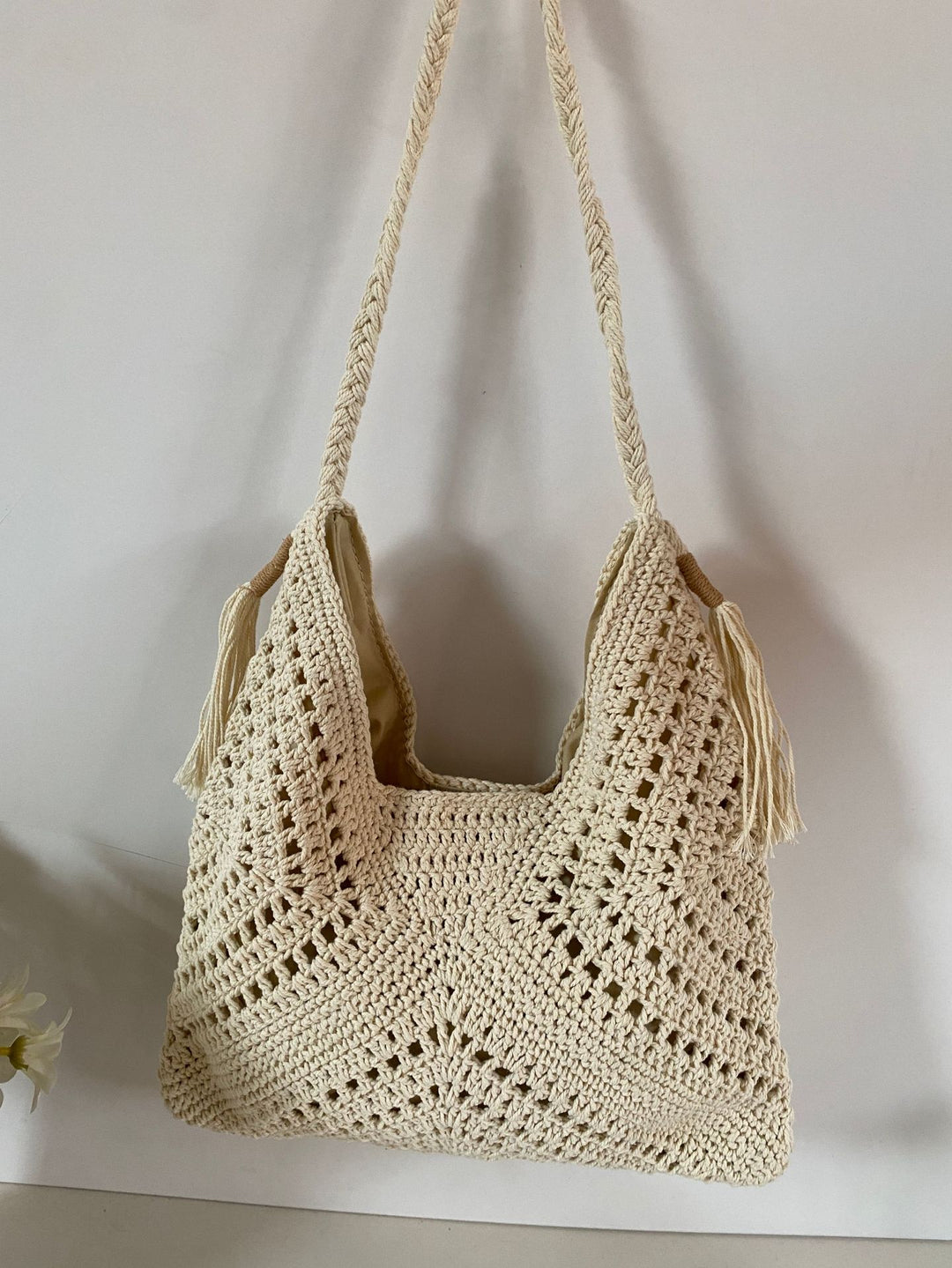 Hand-knotted shoulder bag with tassels and spacious interior Stornfield