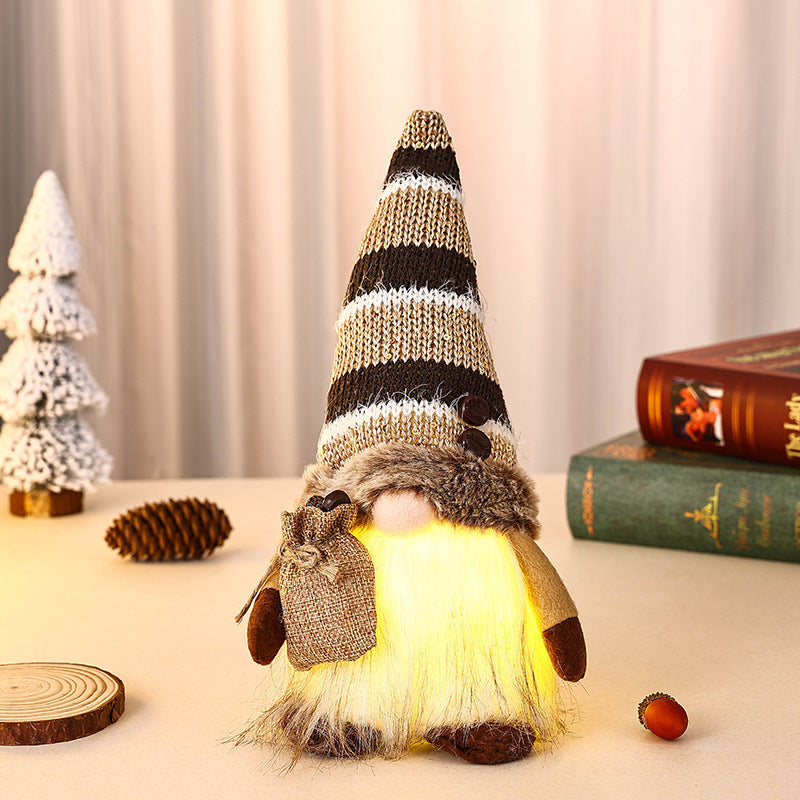 Decorative Christmas gnome with gift package Stornfield