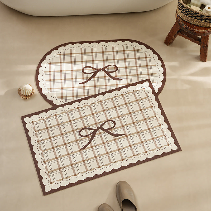 Rectangular wipeable placemat with checked pattern, wavy decorative edge and bow motif Stornfield
