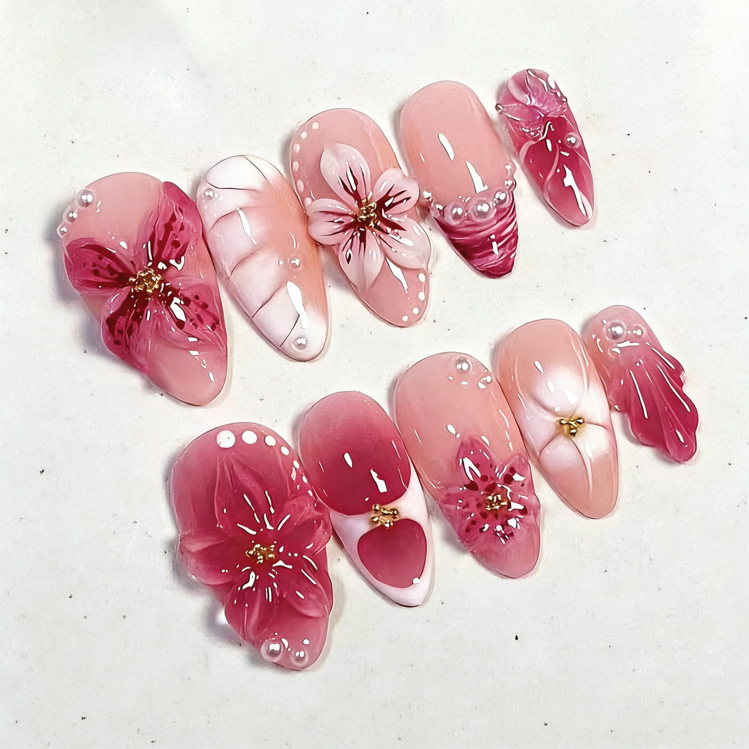 Artificial nail set with floral designs and 3D decorations Stornfield