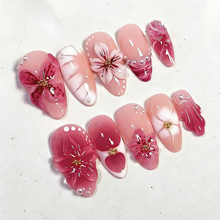 Artificial nail set with floral designs and 3D decorations Stornfield
