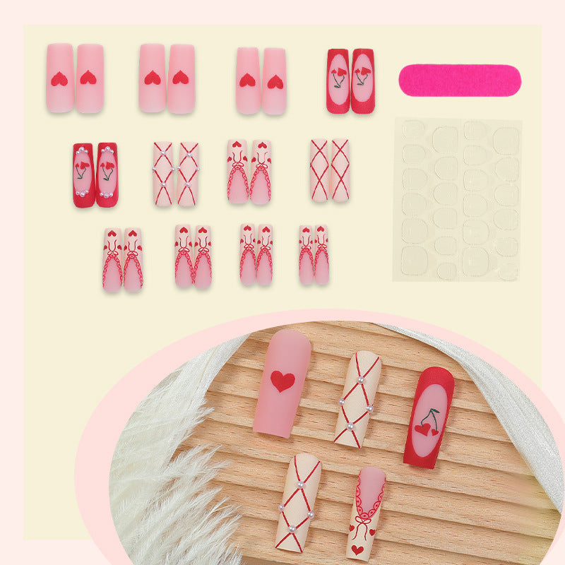 Art nail set with romantic heart and cherry motifs Stornfield