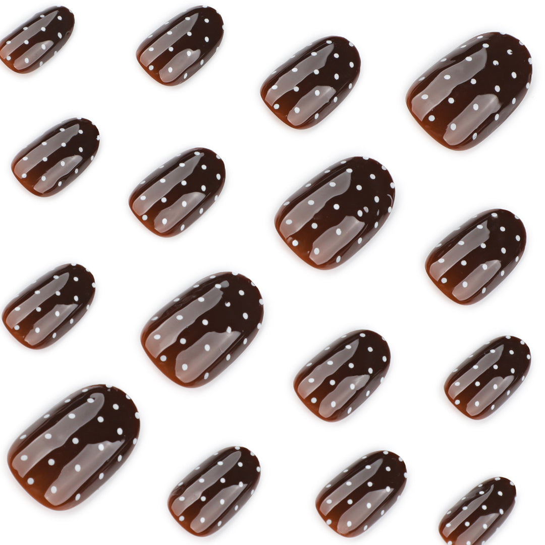 Elegant and modern nail art with polka dots Stornfield