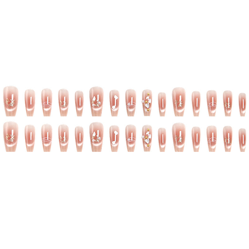 Artificial nail set with elegant glitter and flower decorations Stornfield