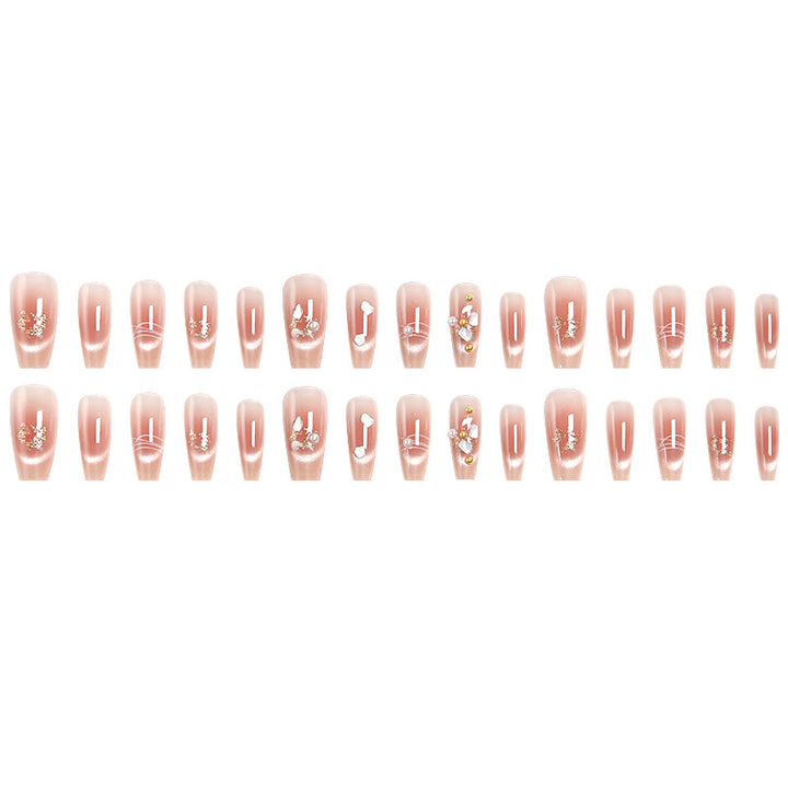 Artificial nail set with elegant glitter and flower decorations Stornfield