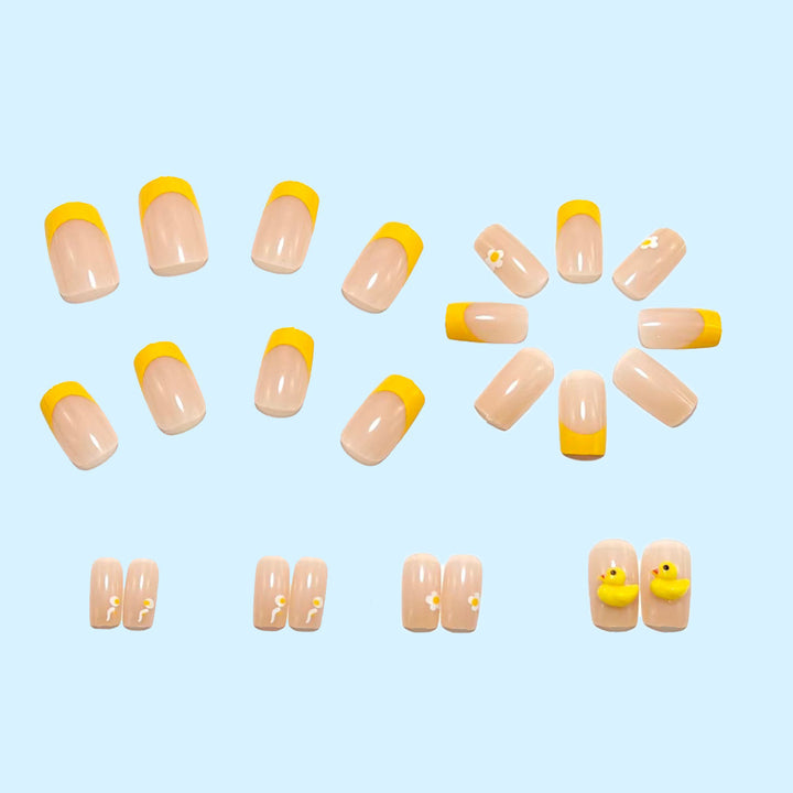 Artificial nails with playful duck motif and spring accents Stornfield